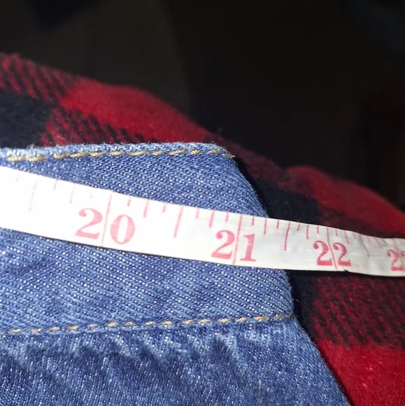 A Roaman's Denim Blue Midi Skirt in a size 26W. Pre-loved in great condition